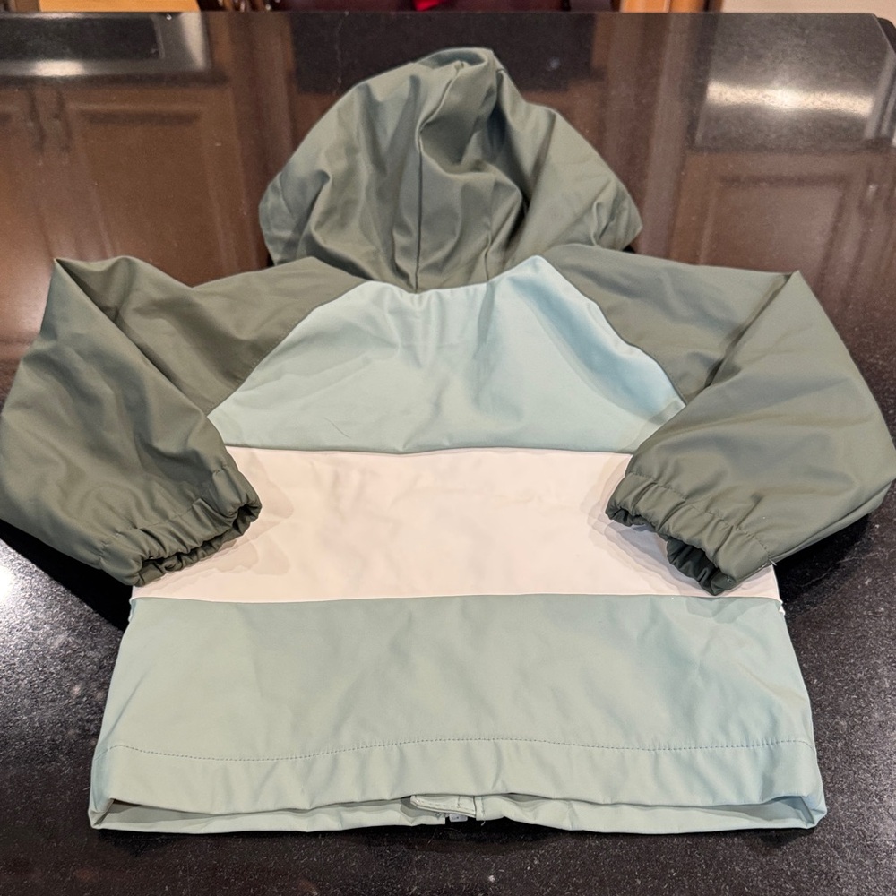 Kids Green Hooded  rain ☔️. Jacket - Picture 7 of 7